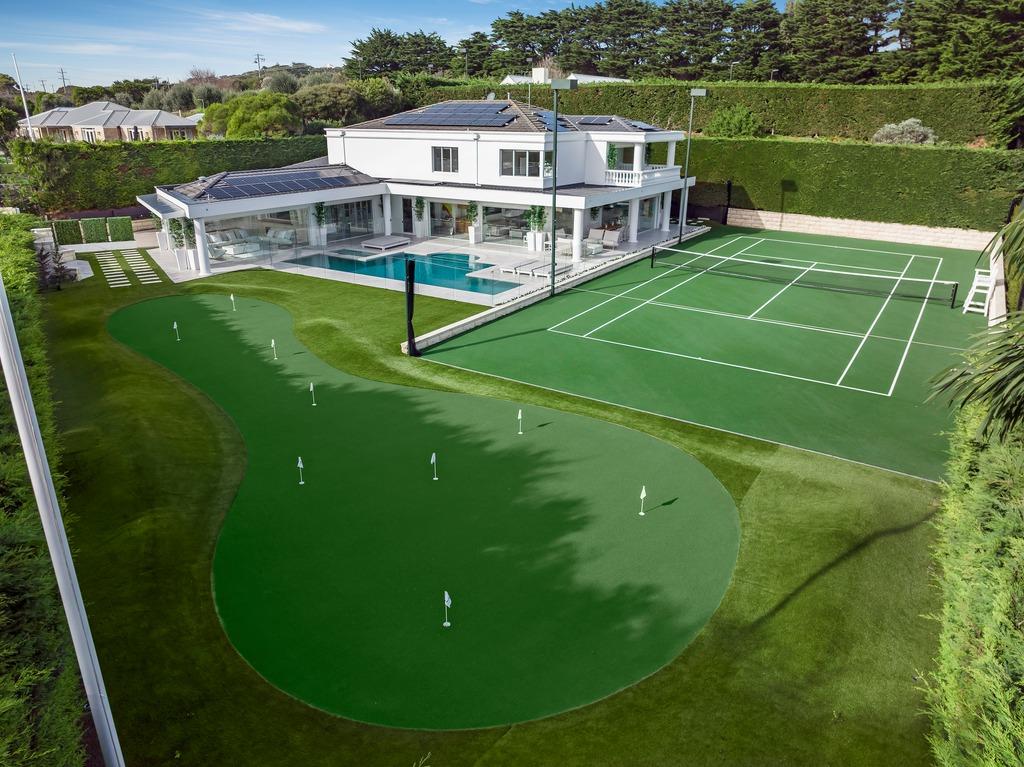 Tennis court and putting green